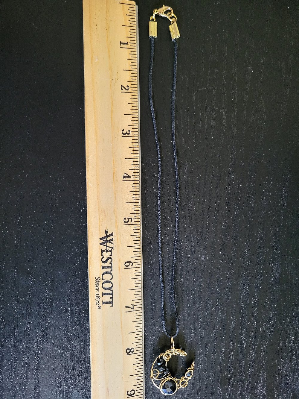 Image of Small Gold and Black Beaded Crescent Moon