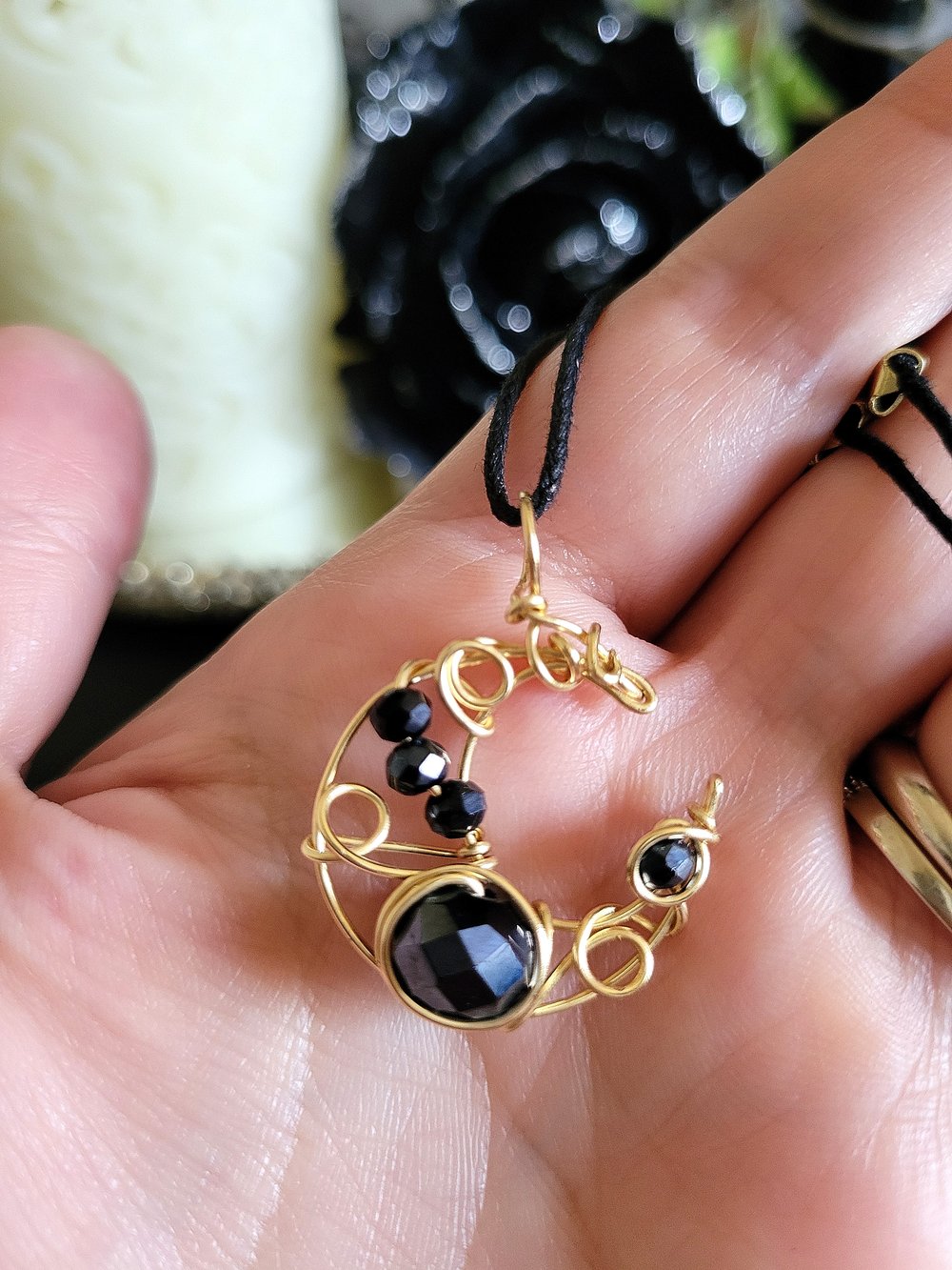Image of Small Gold and Black Beaded Crescent Moon