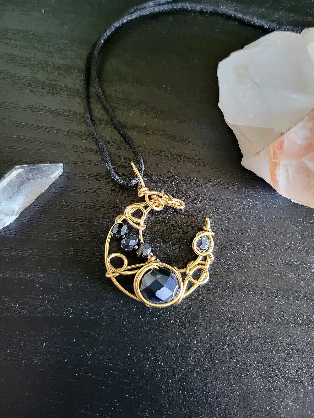 Image of Small Gold and Black Beaded Crescent Moon