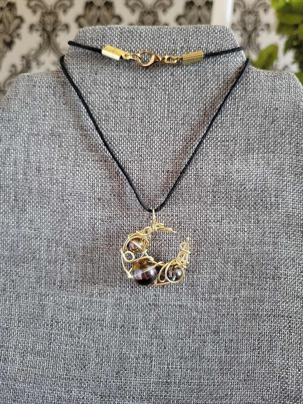 Image of Black Beaded Crescent Moon Pendant in Gold Wire