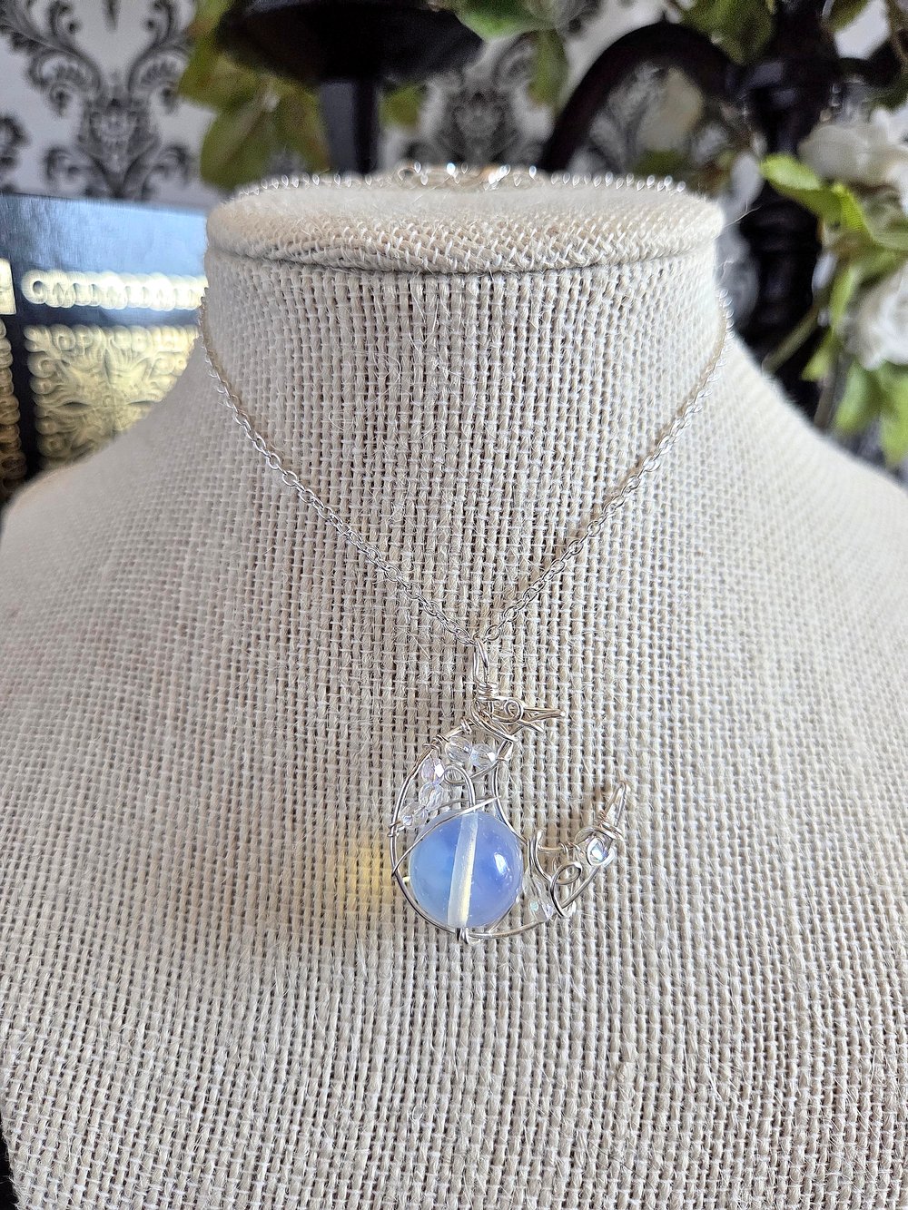 Image of Silver Crescent Moon Pendant with Opaque White Bead