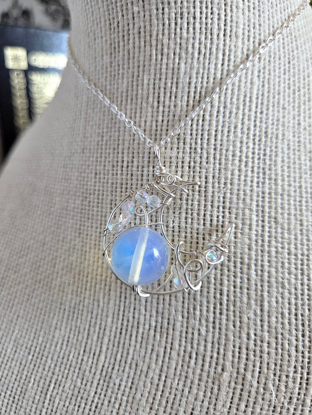 Image of Silver Crescent Moon Pendant with Opaque White Bead