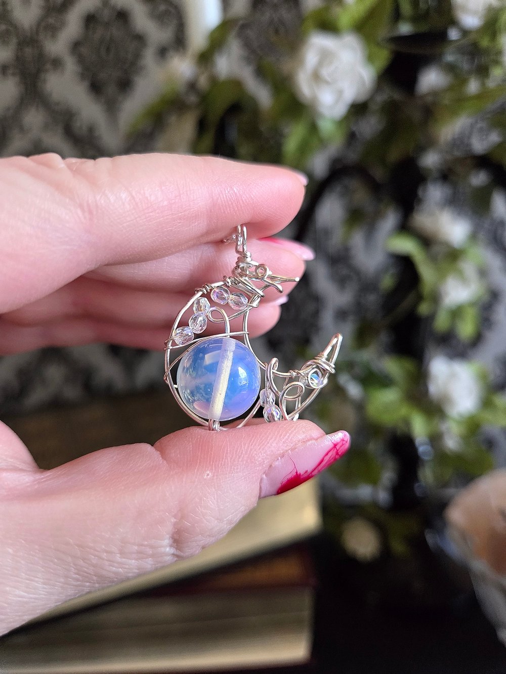 Image of Silver Crescent Moon Pendant with Opaque White Bead