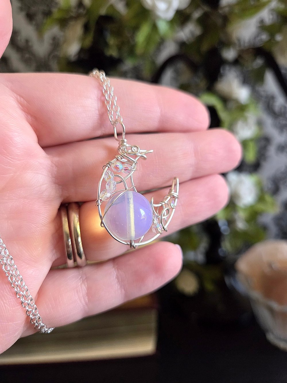 Image of Silver Crescent Moon Pendant with Opaque White Bead