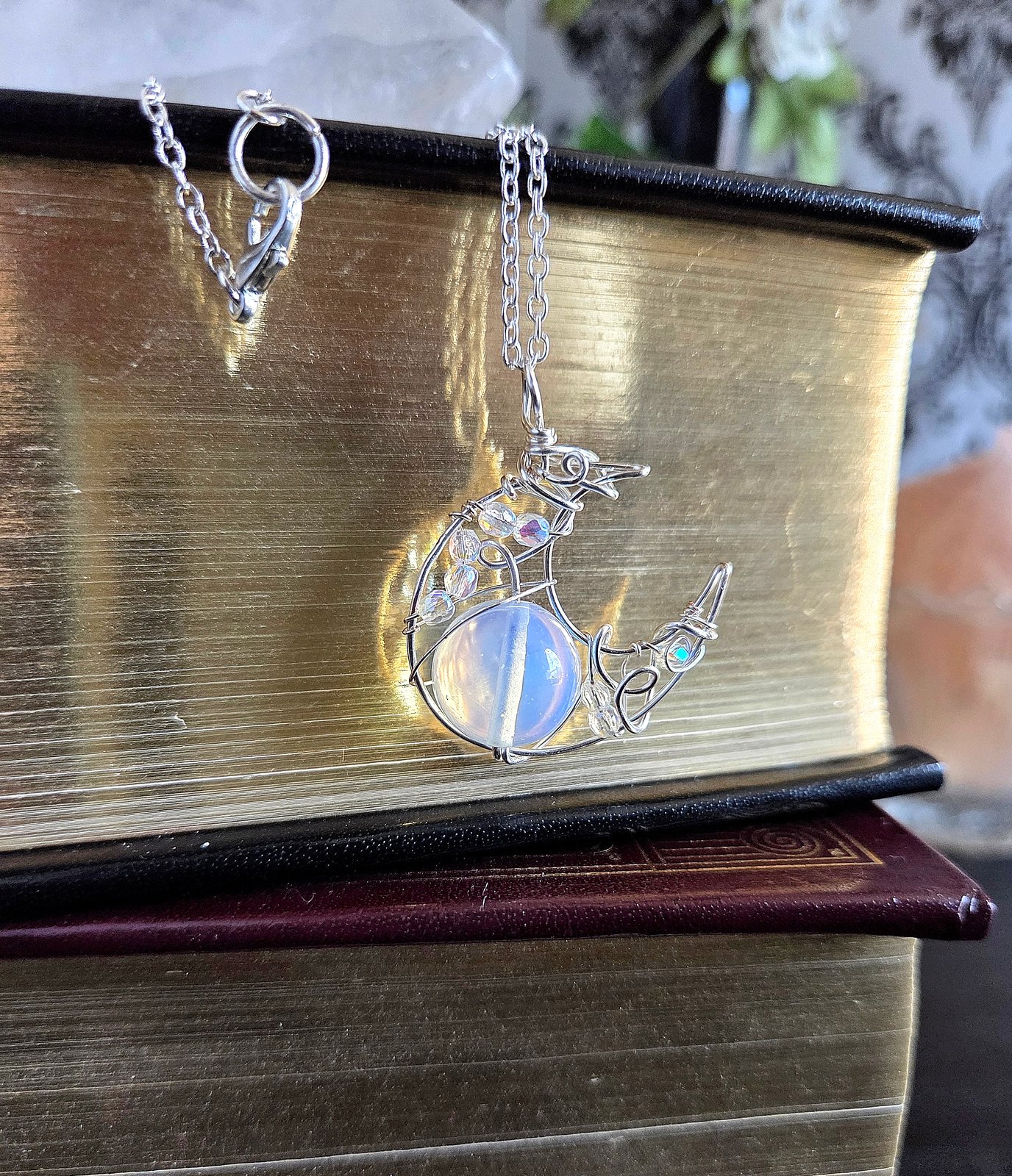 Silver Crescent Moon Pendant with Opaque White Bead | The Mystic