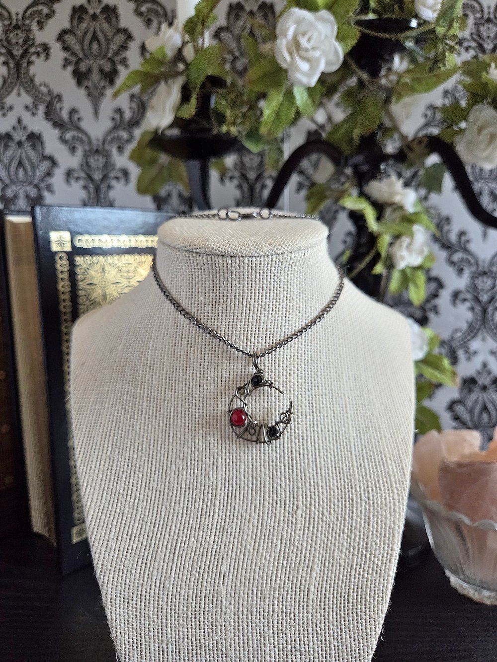 Image of Small Black and Red Beaded Crescent Moon Gunmetal Pendant Necklace