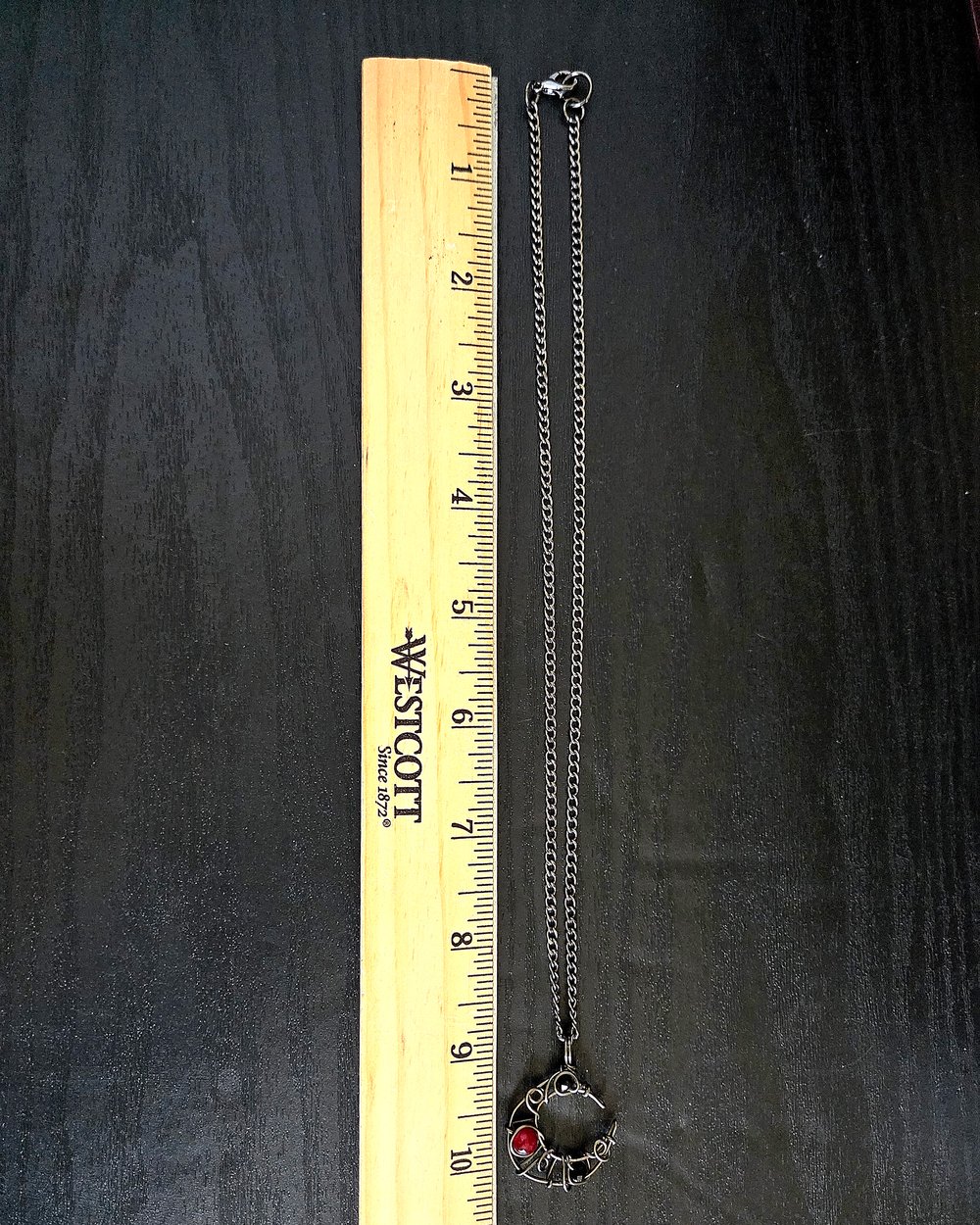 Image of Small Black and Red Beaded Crescent Moon Gunmetal Pendant Necklace