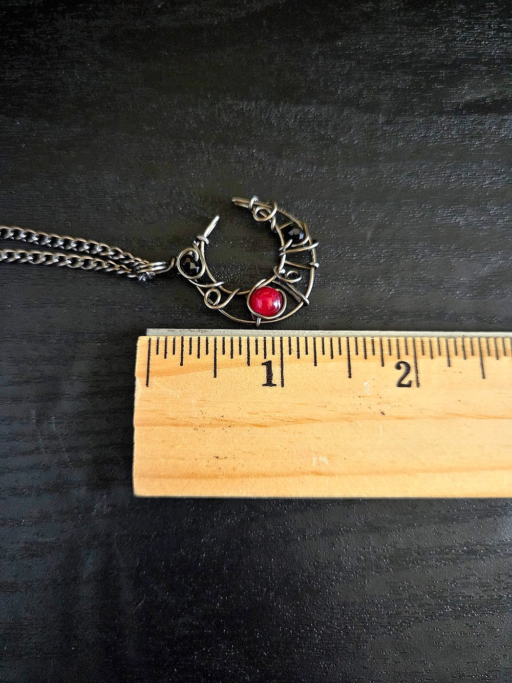 Image of Small Black and Red Beaded Crescent Moon Gunmetal Pendant Necklace
