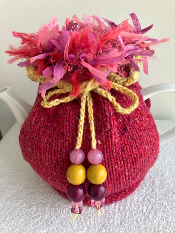 Image of large PINK Go On! tea cosie