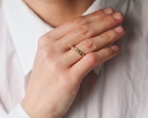 Image of 18ct yellow gold 3mm flat court 'fir engraved' ring