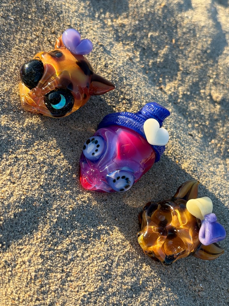 Image of collab with ghost   alien   kitty skull