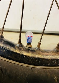 Image 2 of Blue Glow Skull Valve Stem Caps