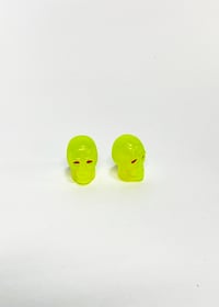 Image 1 of Yellow Skull Valve Stem Caps