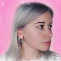 Image 2 of Monster Skulls Couple Earrings