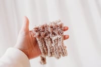 Image 1 of Chocolate fluff tieback 