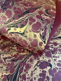 Image 2 of  'Gold and black vein' on Maroon