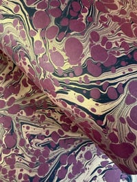Image 1 of  'Gold and black vein' on Maroon