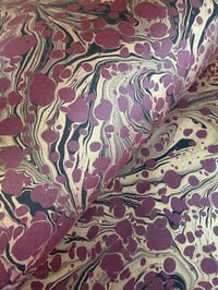 Image 4 of  'Gold and black vein' on Maroon