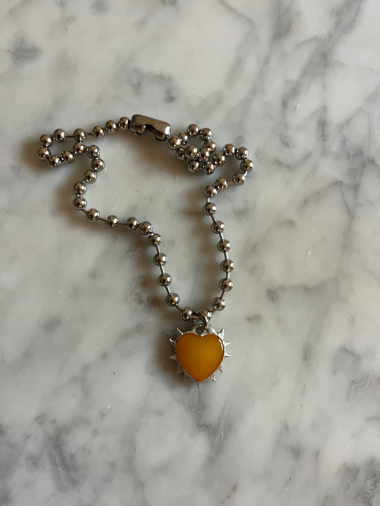 Image of SINGLE YOLK CHARMER