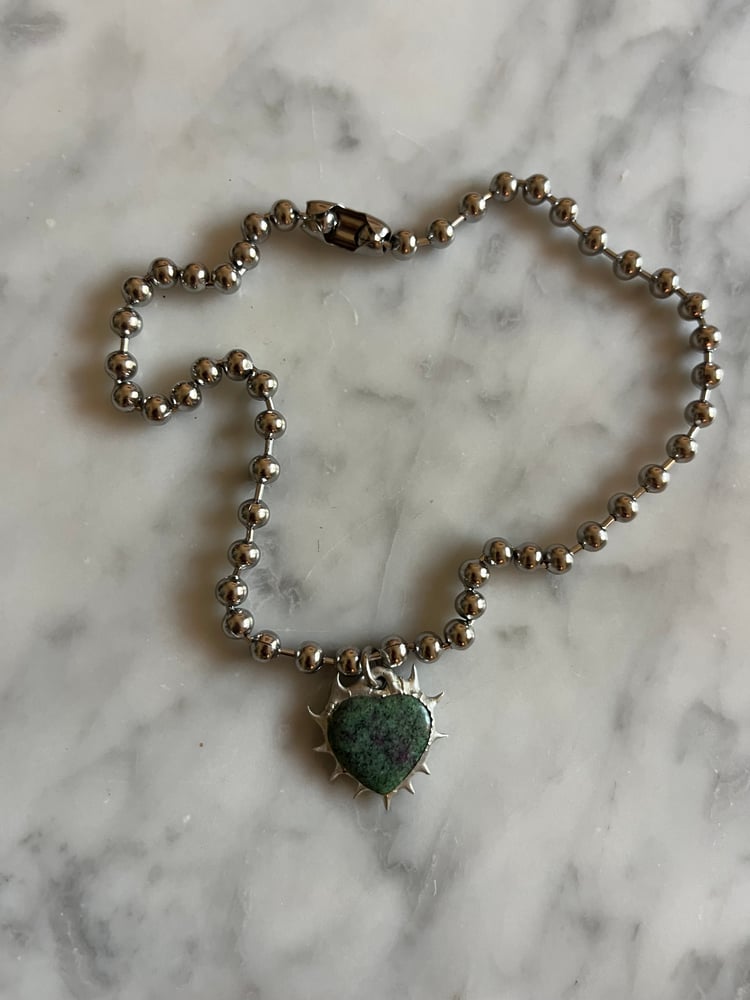 Image of SINGLE MOSSY CHARMER