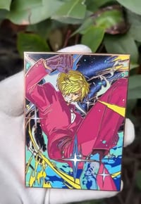 Image 2 of Black Leg TCG in hands 