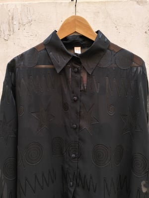 Camicia nera fantasia tono su tono 