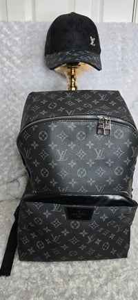 Image 1 of Black Extra Large Backpack and hat