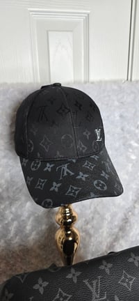 Image 2 of Black Extra Large Backpack and hat