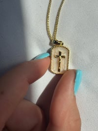 Image 2 of gold and white cross necklace