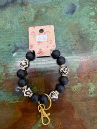 Image 1 of Black and leopard keychain 