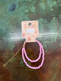 pink beaded bracelet and anklet set
