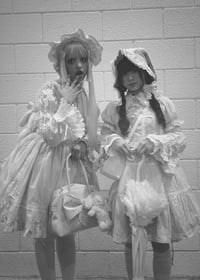 MONOGURUI poncho: (THE VOID OF VICTORY)