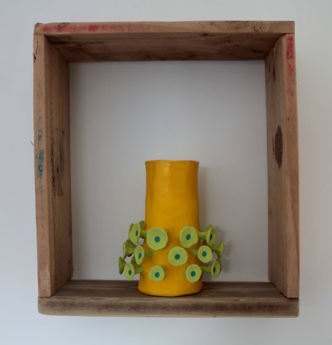 Yellow ceramic vessel
