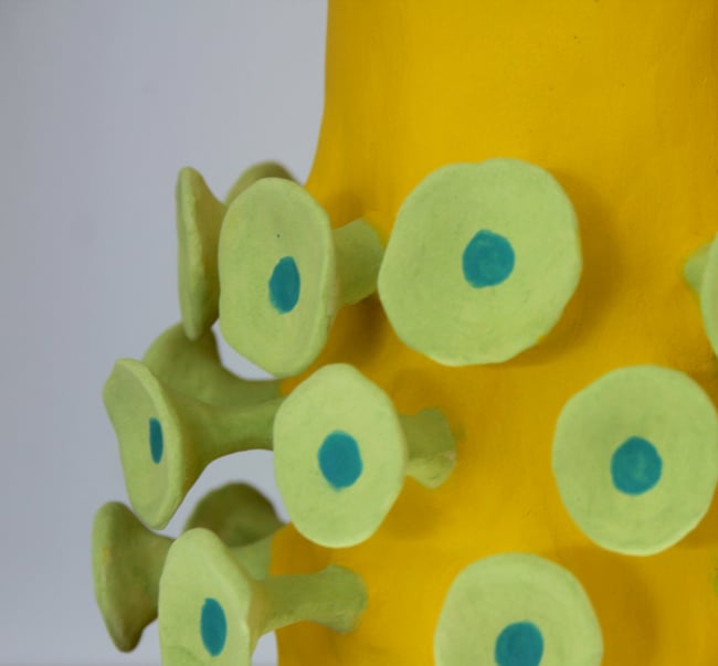 Yellow ceramic vessel