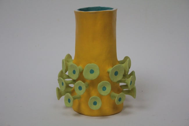 Yellow ceramic vessel