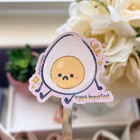 Image 1 of Eggs-hausted Tired Egg Holographic Die-Cut Sticker