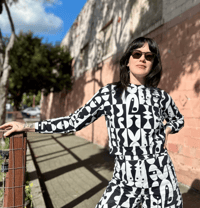 Image 1 of Illusions in Track Top