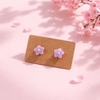 PURPLE FLOWER STUD WITH WHITE CENTER