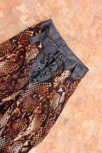 Image 5 of Highwaisted lace up flare pants with brown snake print (Size S)