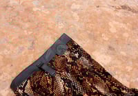 Image 6 of Highwaisted lace up flare pants with brown snake print (Size S)