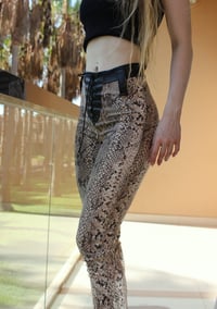 Image 1 of Highwaisted lace up flare pants with sandy snake print (Size S)