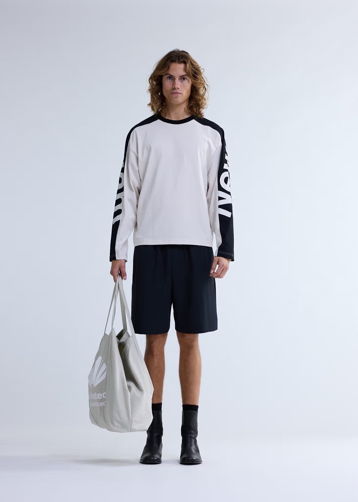 Image of NEW AMSTERDAM SURF ASSOCIATION NAME LONGSLEEVE WARM SAND/BLACK