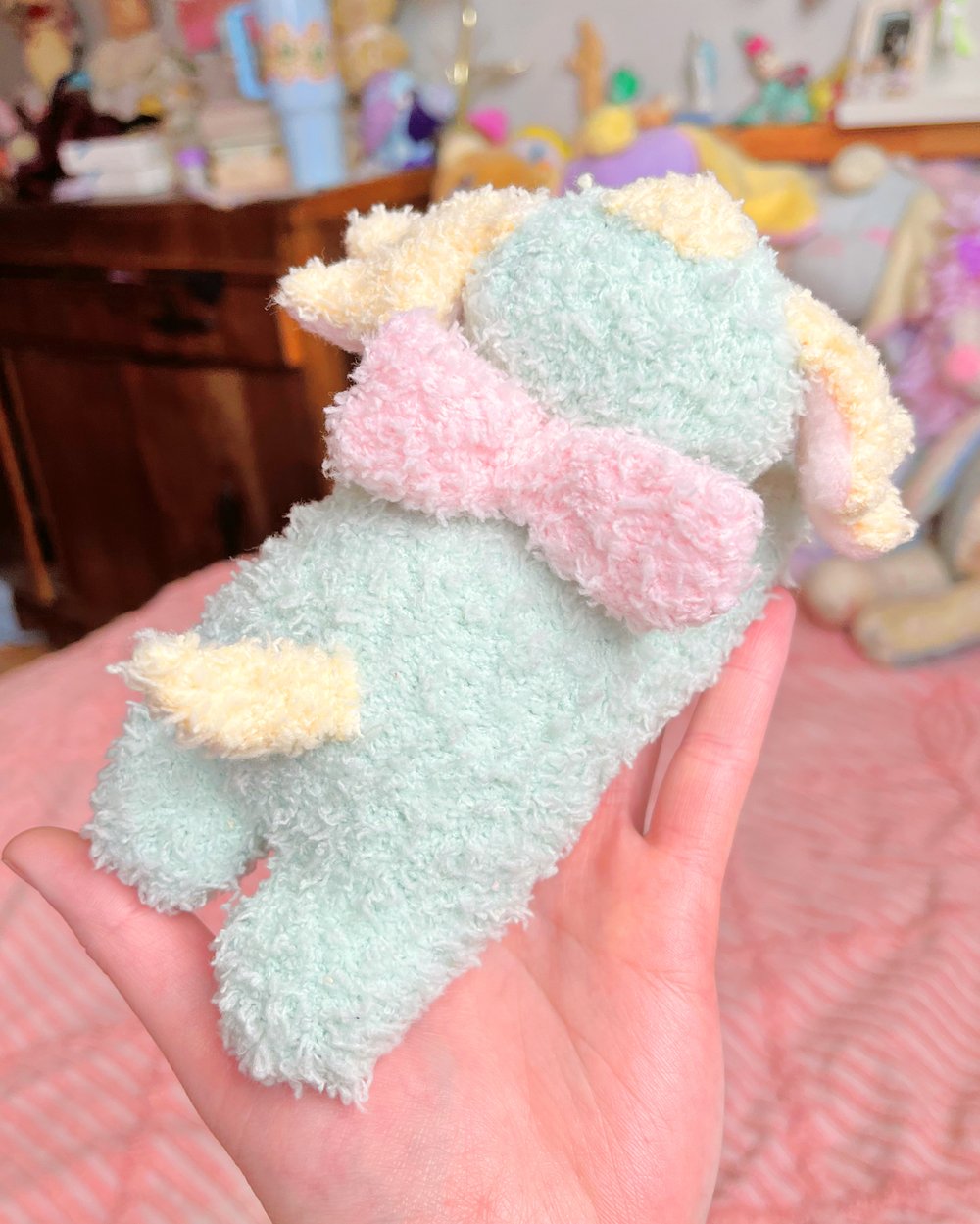 Image of Wishpup, green with pink bow