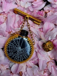 Image 1 of RARE VINTAGE ornate perfume bottle brooch with preserved web 