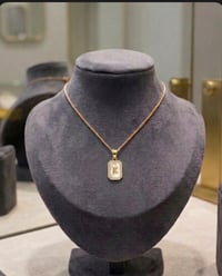 gold initial necklace with diamond border 