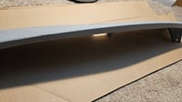 Image 15 of Late 74 260z - 78 280z lower front valance CENTER