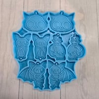 Image 1 of Bat/skull topper mould 