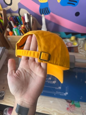 Cooperation Not Competition Hat
