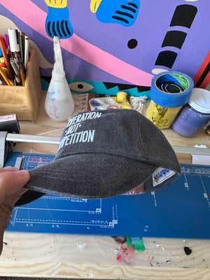 Cooperation Not Competition Hat