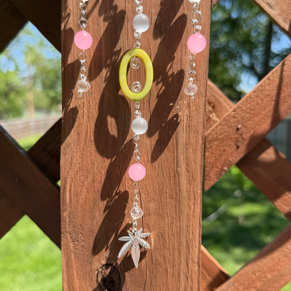 Image of pink terpene sun catcher 